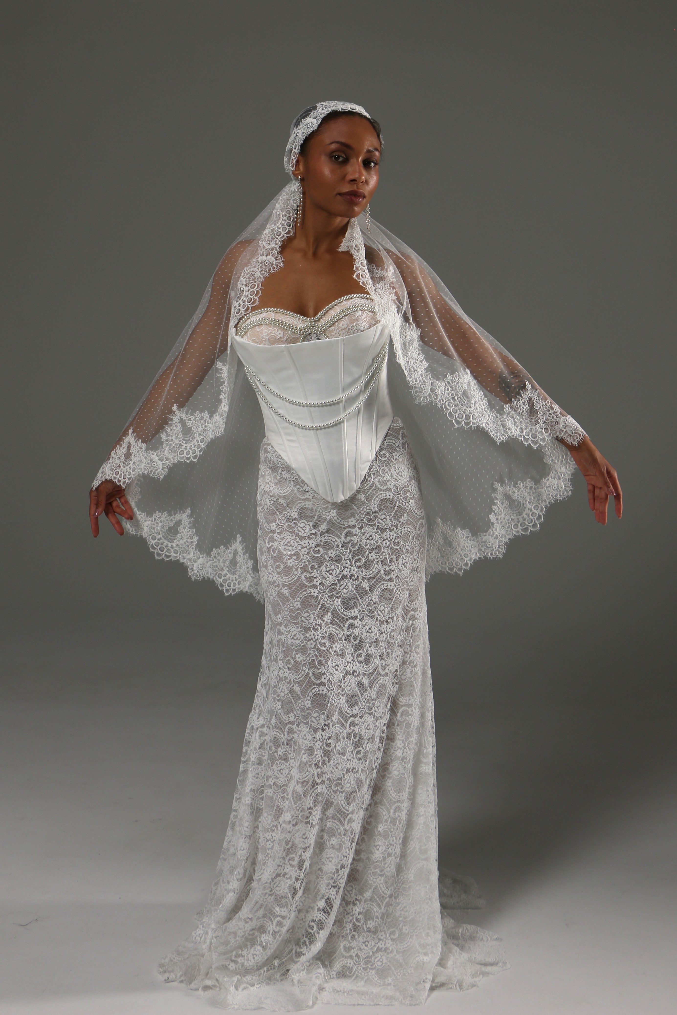 Bride wearing a Juliet cap bandana veil with Chantilly lace