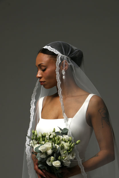 Cathedral-length wedding veil crafted from lightweight soft tulle.