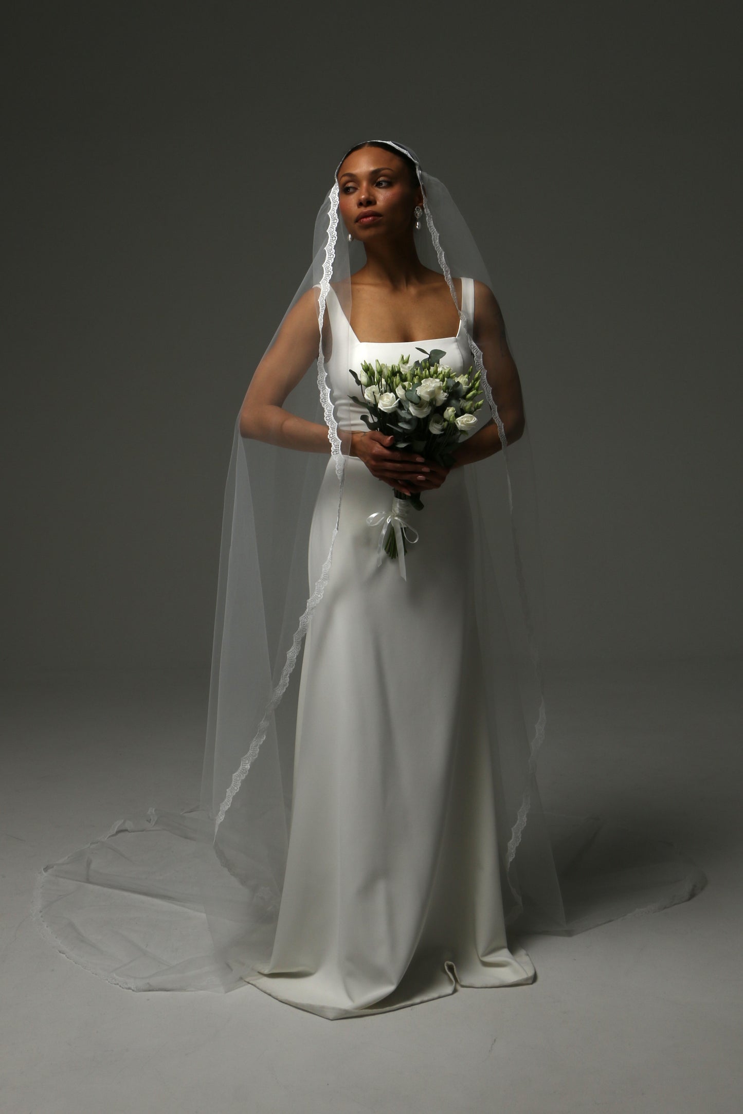 Traditional Juliet cap veil for a romantic wedding ceremony.