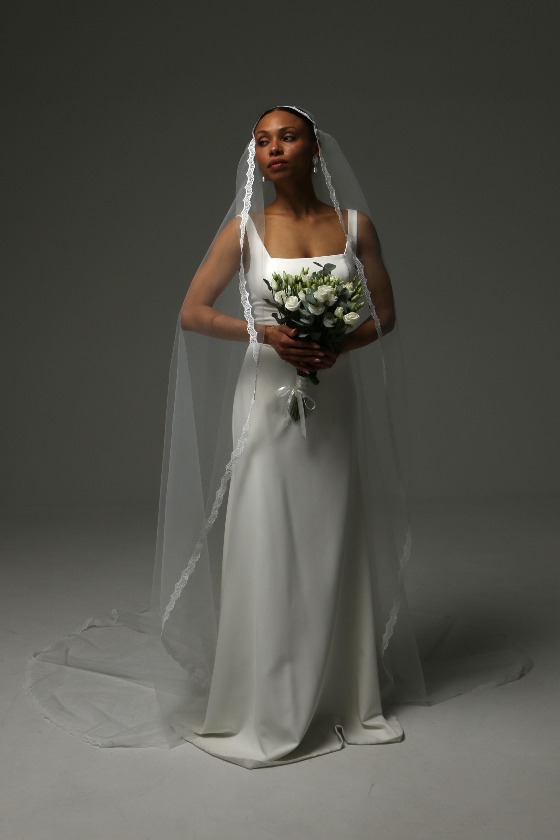 Traditional Juliet cap veil for a romantic wedding ceremony.