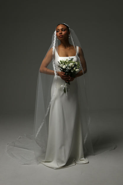 Traditional Juliet cap veil for a romantic wedding ceremony.