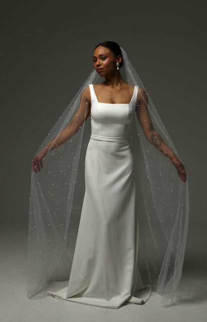 Elegant cathedral pearl veil with delicate hand-applied pearl accents.