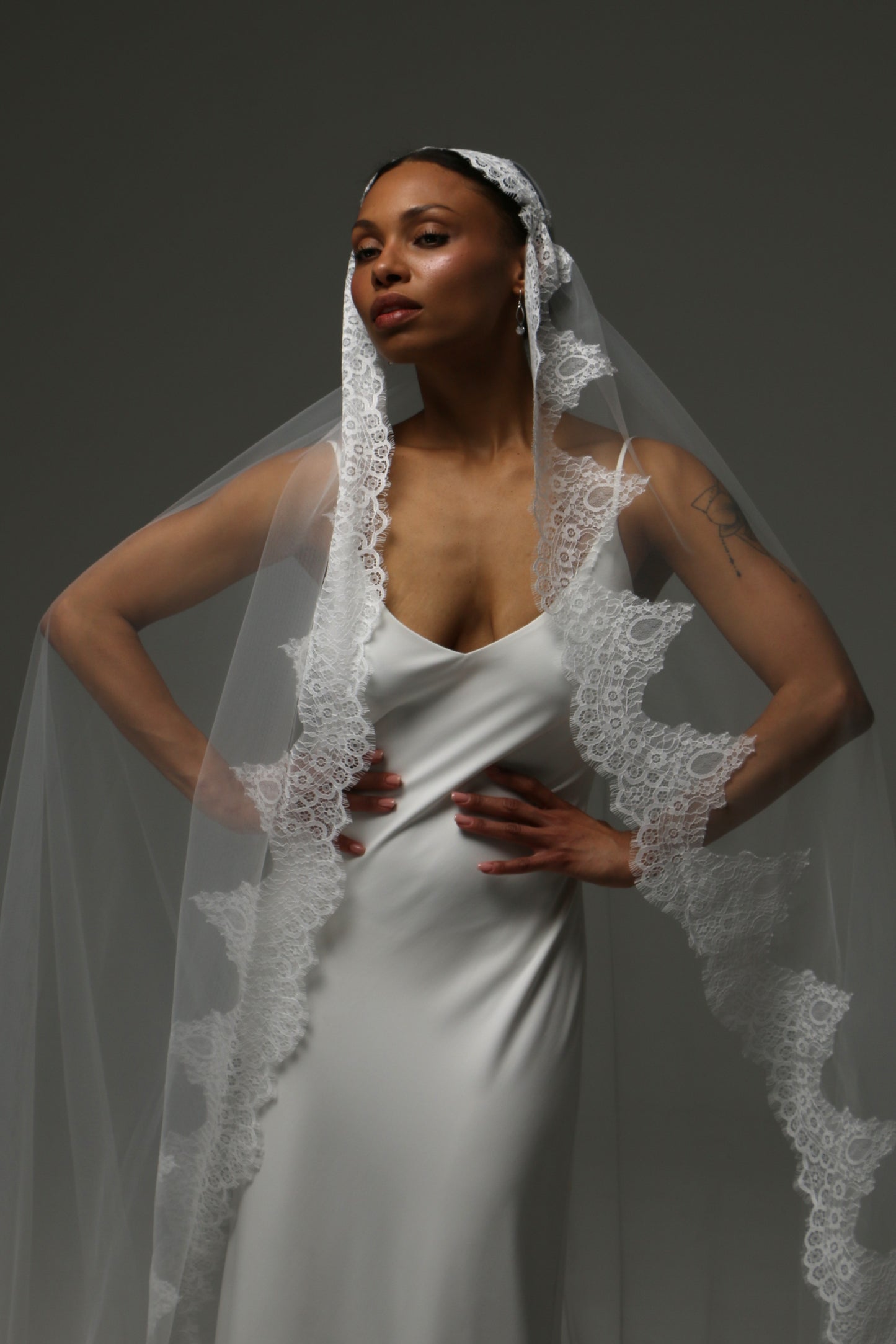 Classic mantilla-style wedding veil for timeless bridal elegance.