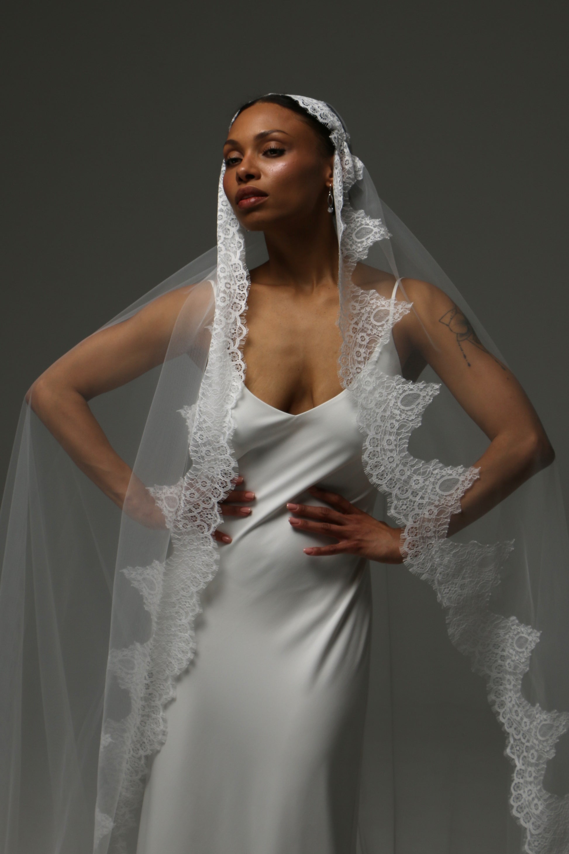 Classic mantilla-style wedding veil for timeless bridal elegance.