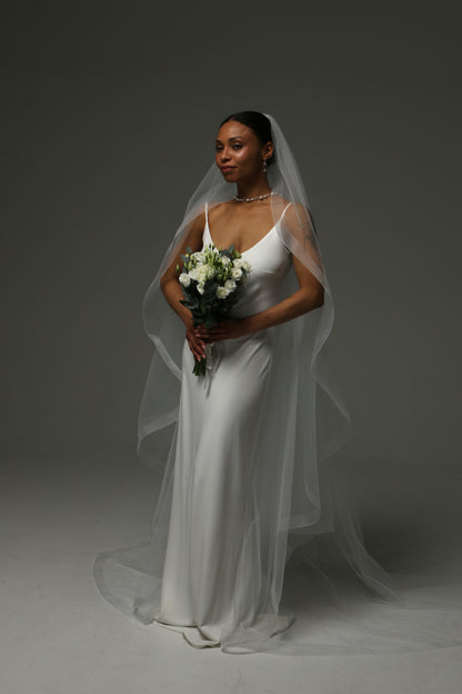 Modern cathedral veil creating graceful movement and volume.