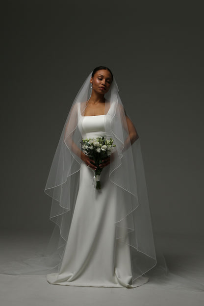 Timeless bridal veil designed for minimalist wedding styling.