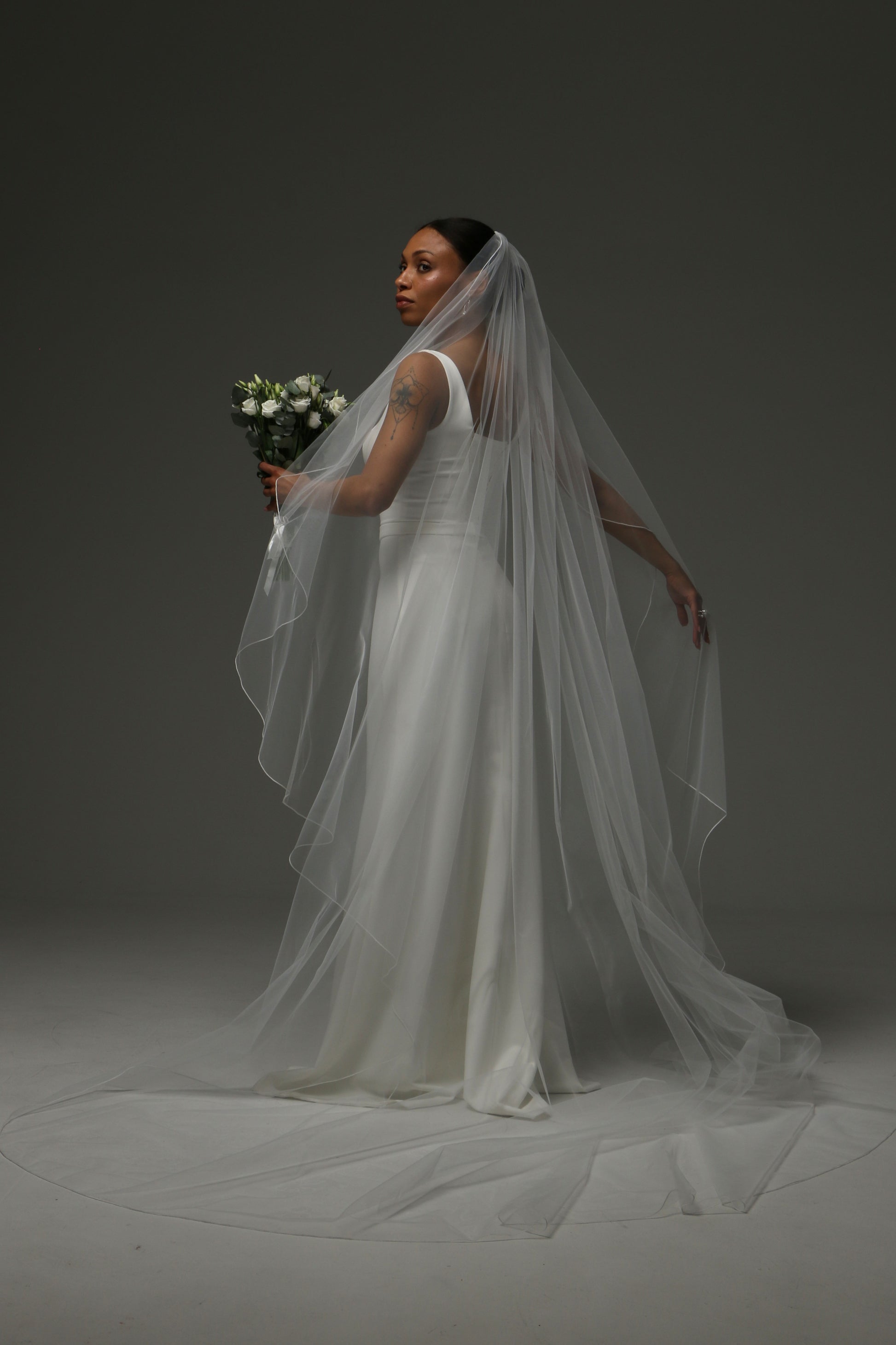 Soft illusion tulle veil designed for contemporary brides.