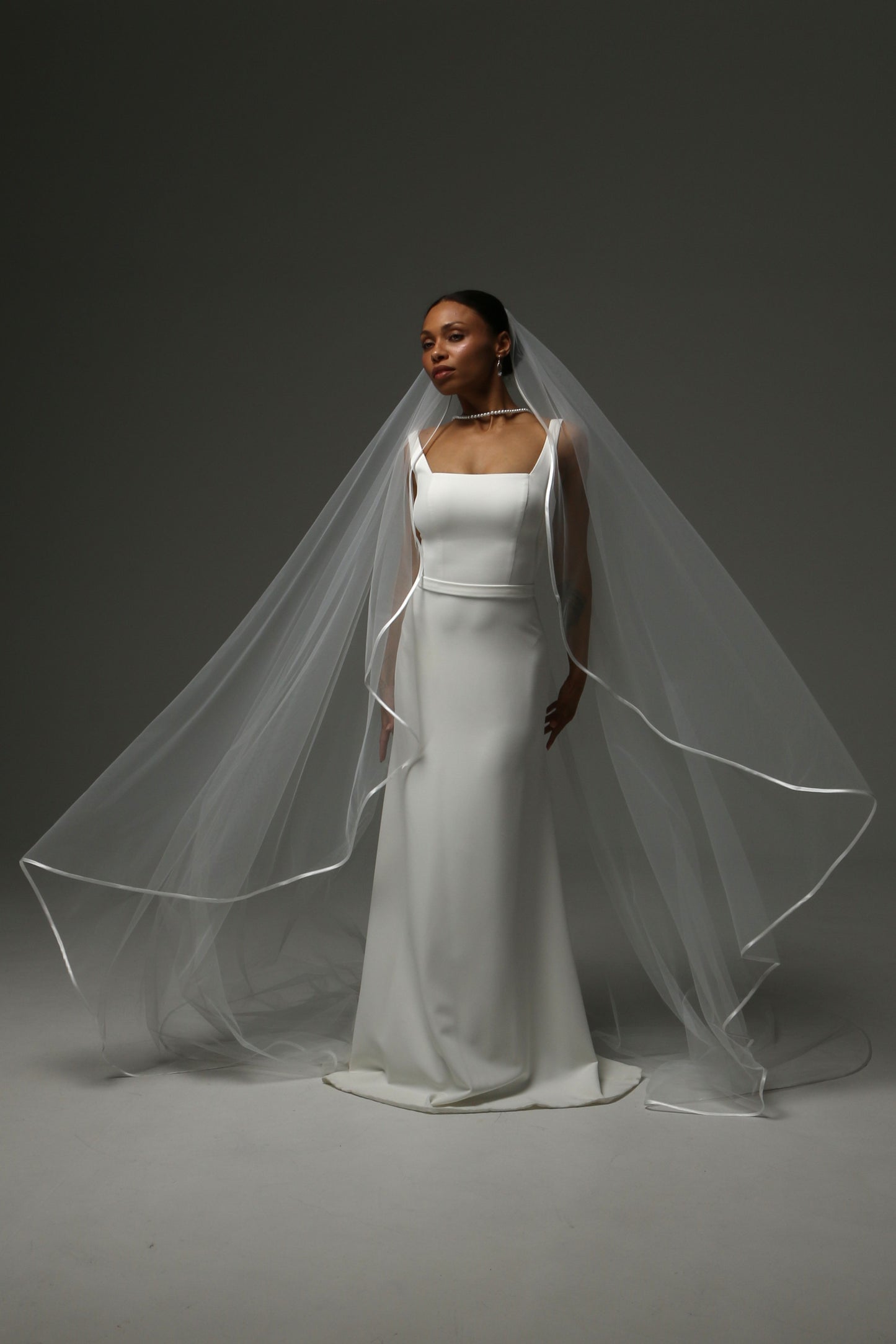 Lightweight wedding veil crafted from soft illusion tulle.