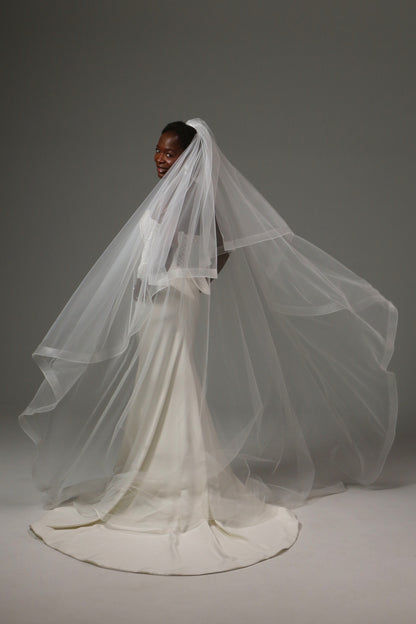 Soft tulle wedding veil designed for elegant ceremonies.