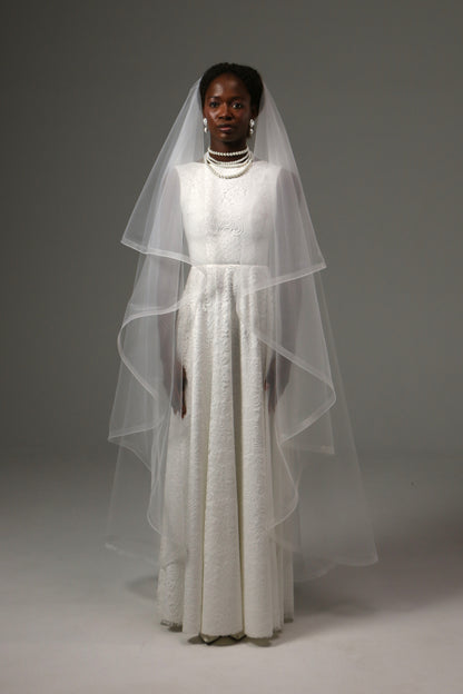 Two-tier waltz wedding veil with horsehair edge and blusher.