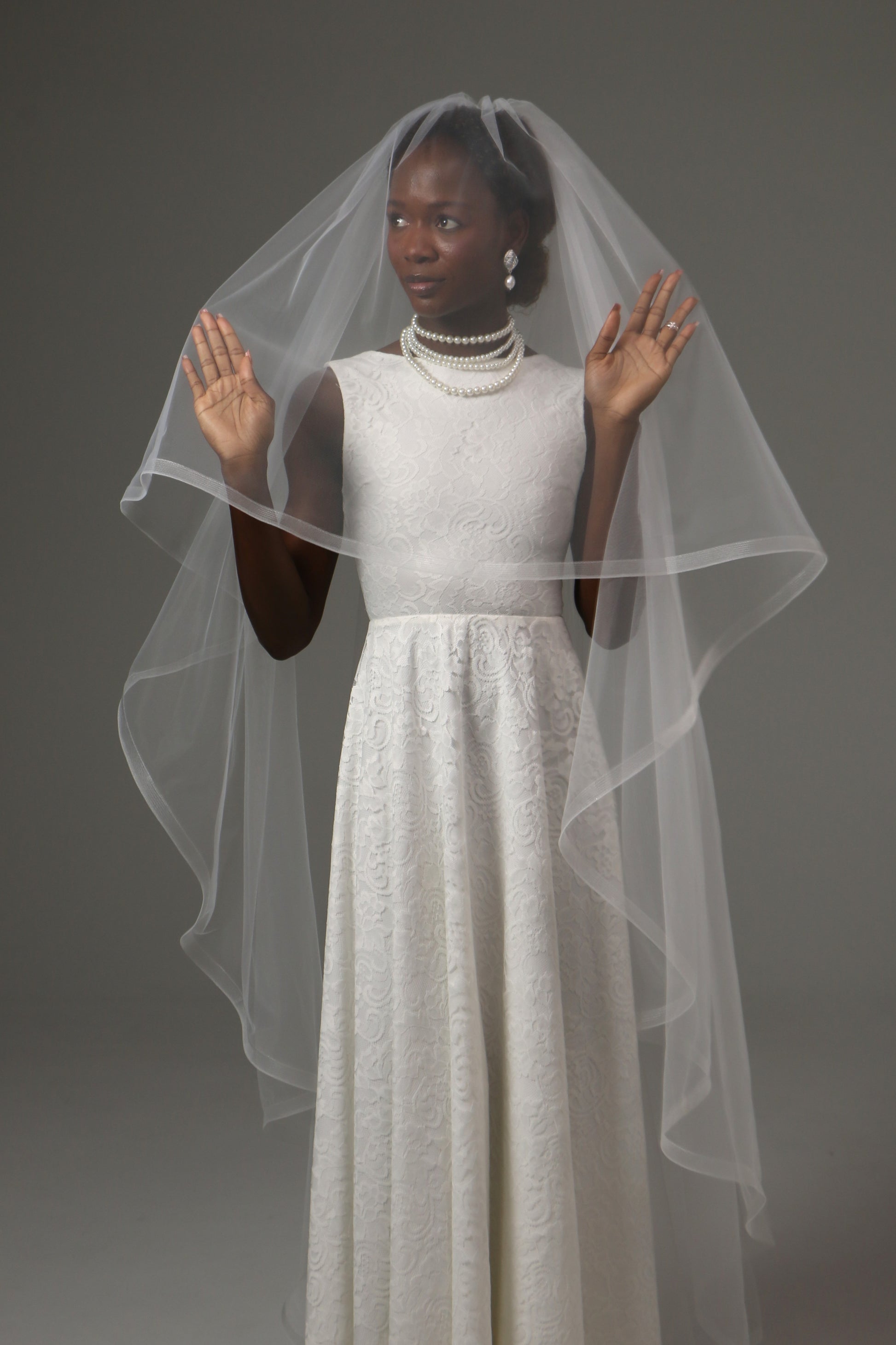 Soft illusion tulle veil with airy and lightweight construction.