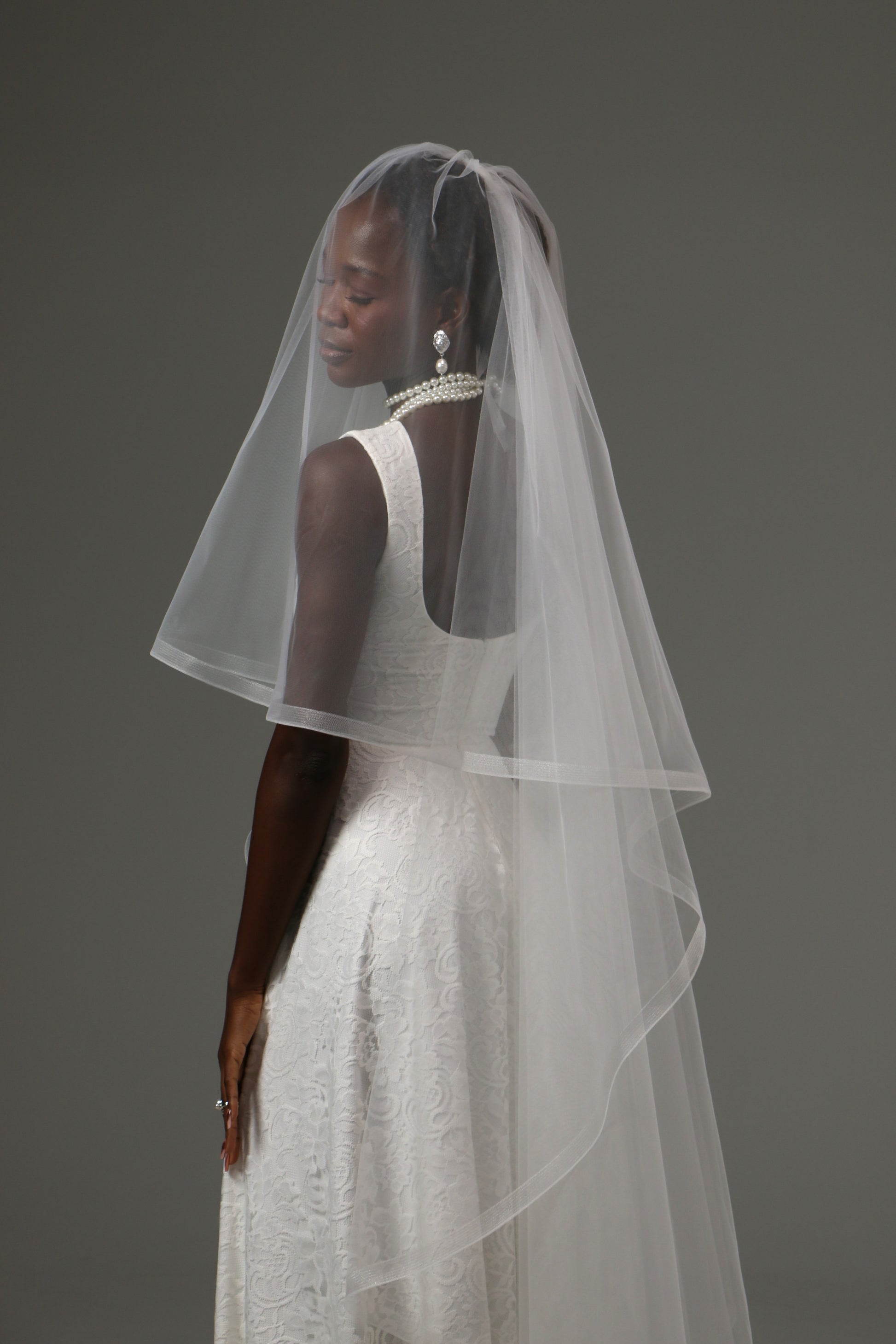 Elegant two-tier veil designed for minimalist wedding styling.