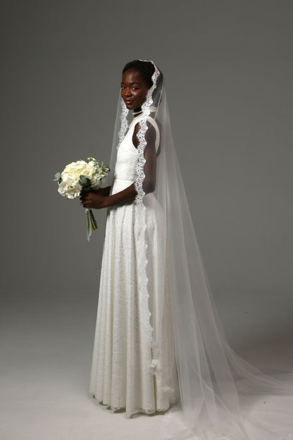 Elegant mantilla veil designed for church wedding ceremonies.