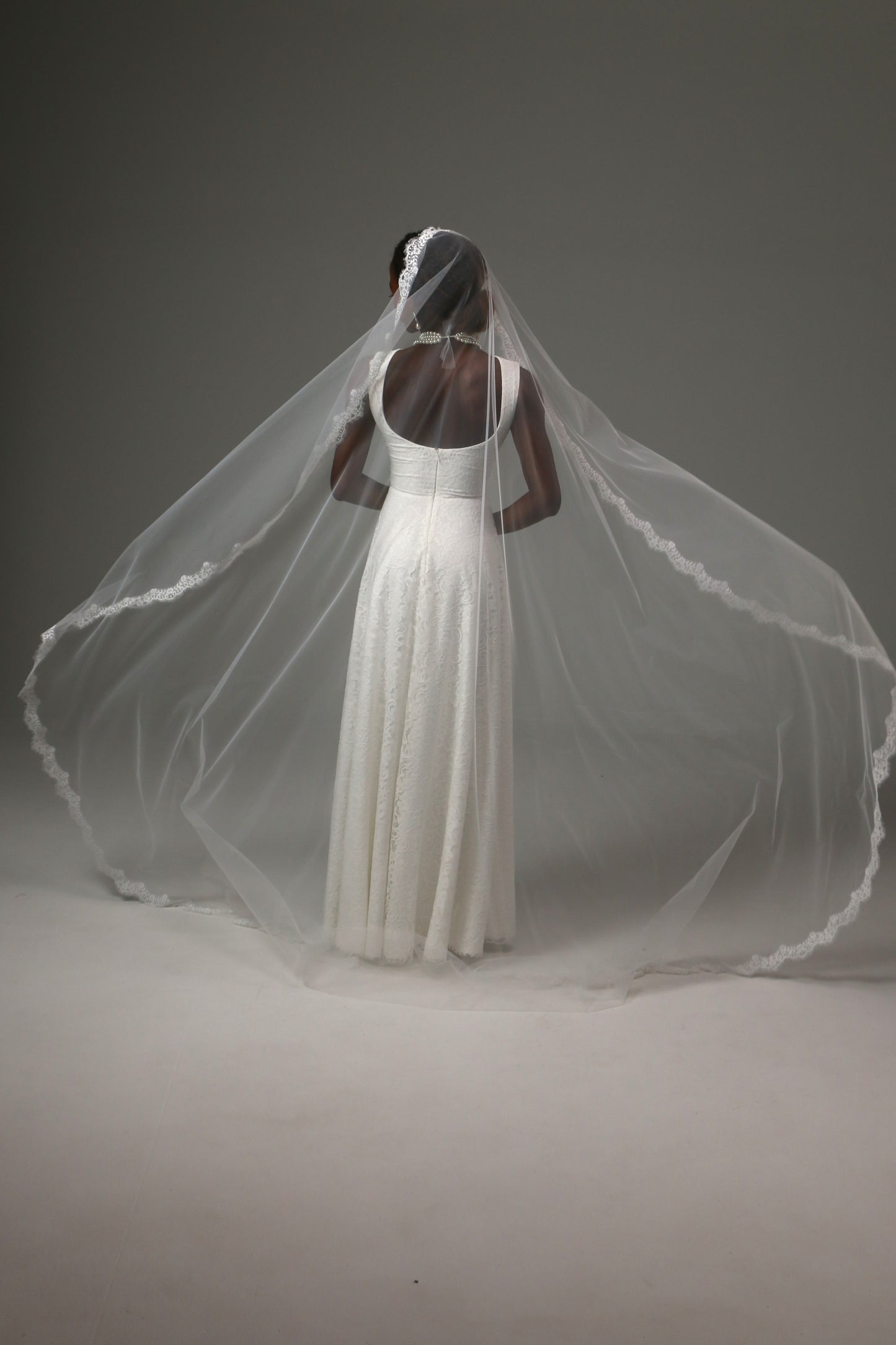 Classic bridal veil inspired by traditional mantilla styling.