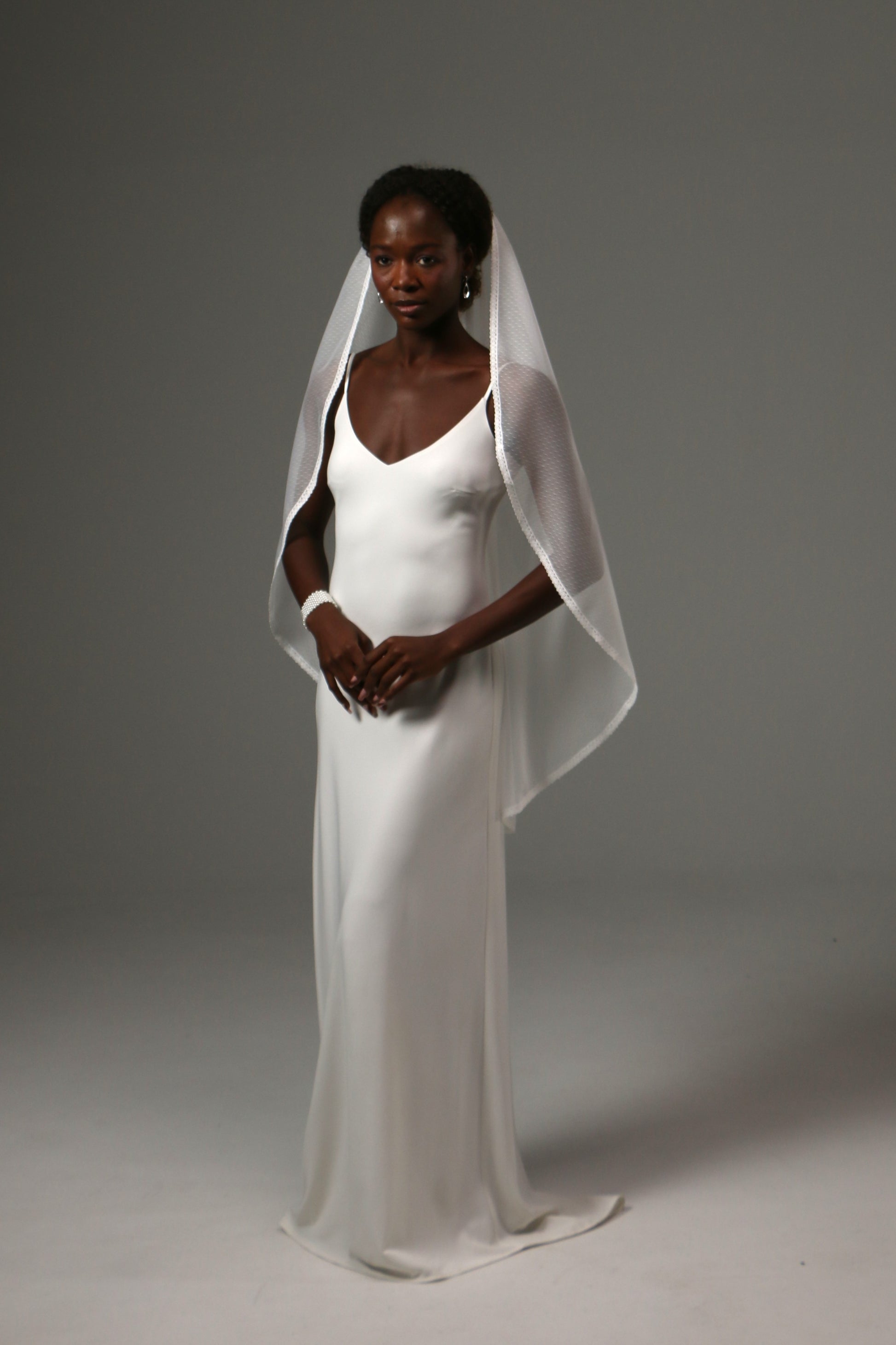 Lightweight wedding veil crafted from premium dotted tulle.