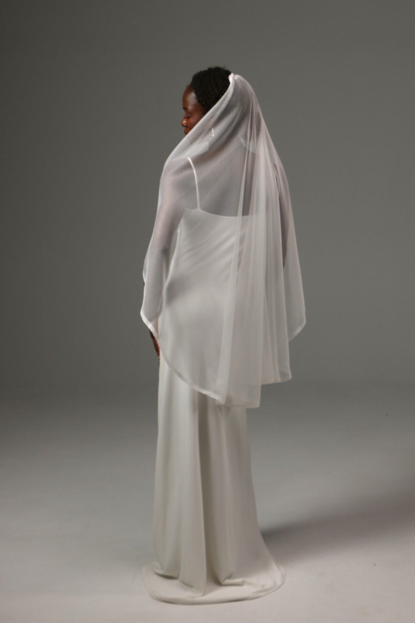 Dotted tulle bridal accessory designed for contemporary brides.