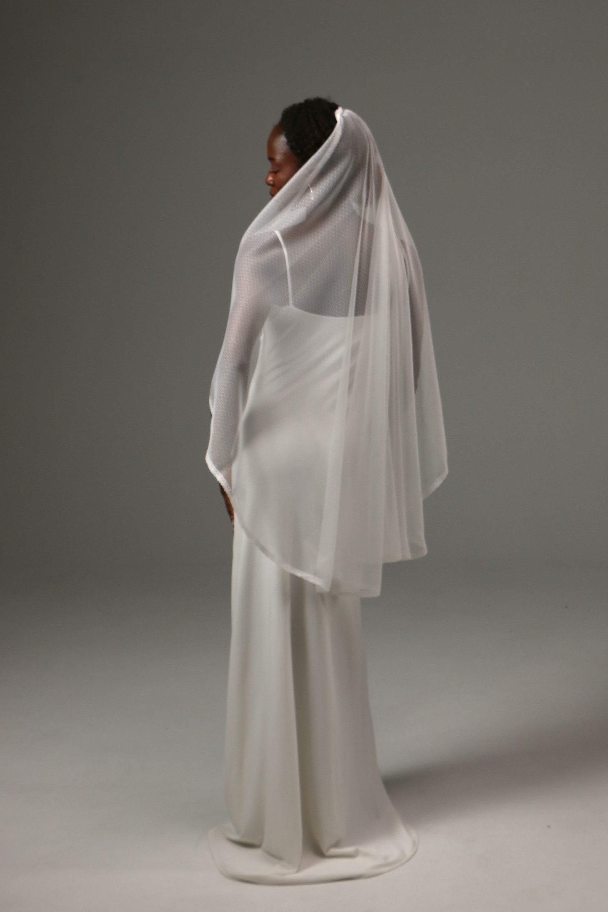 Dotted tulle bridal accessory designed for contemporary brides.