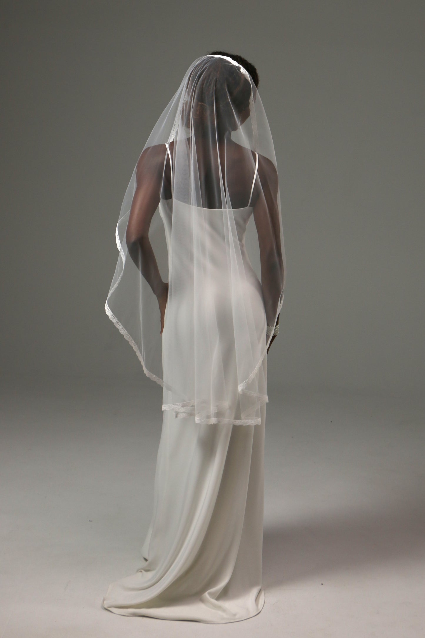 Fingertip wedding veil offering graceful movement and comfort.
