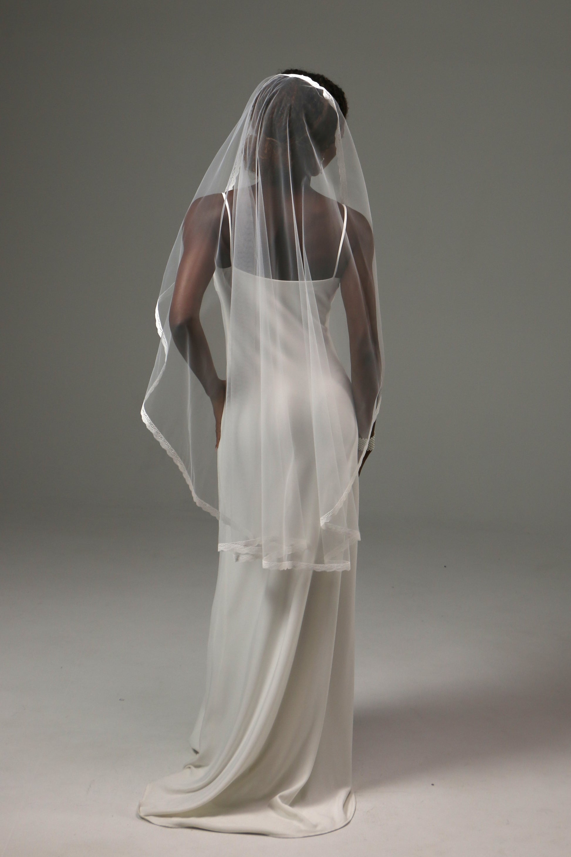 Fingertip wedding veil offering graceful movement and comfort.