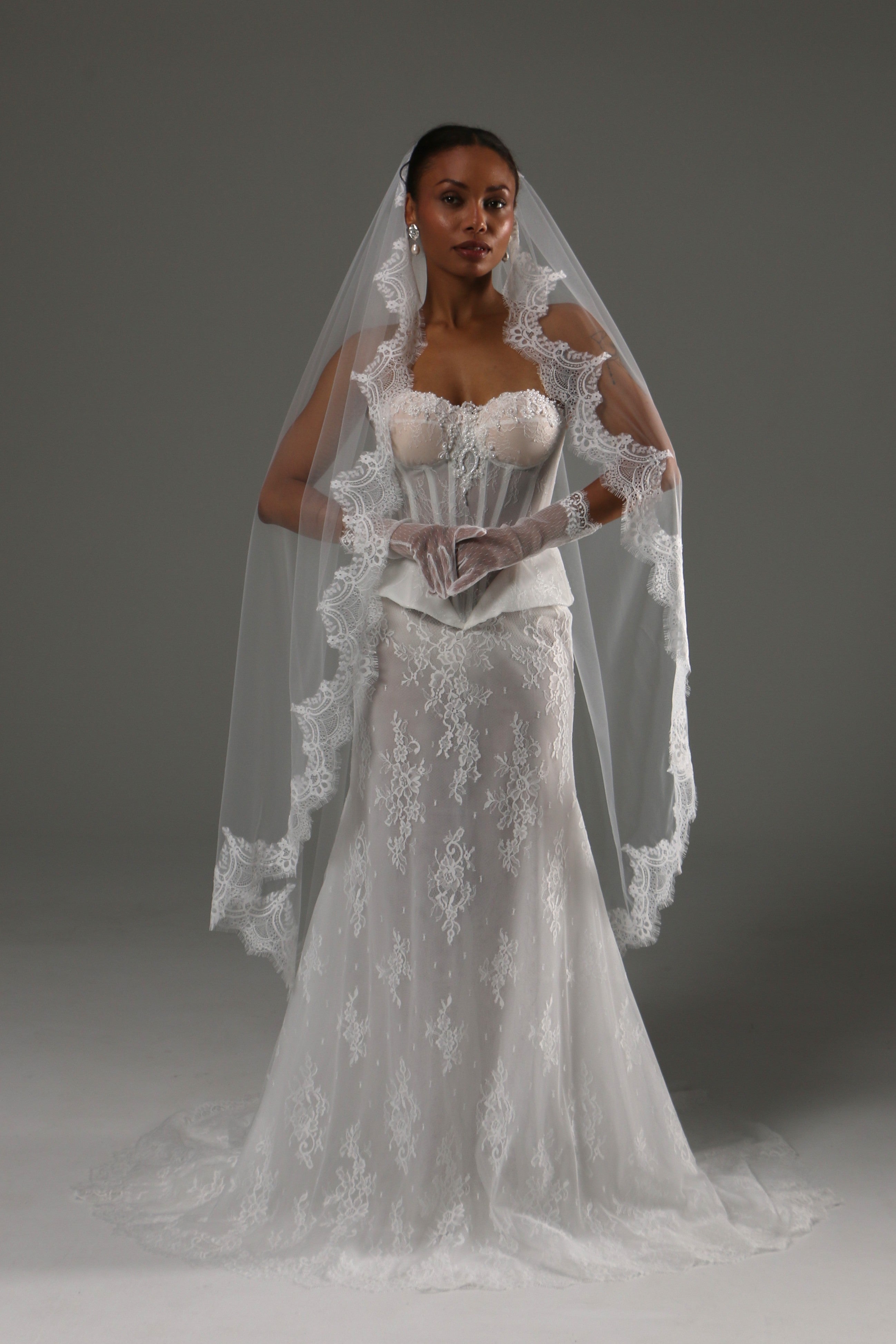 Chantilly lace wedding veil with gathered cathedral length